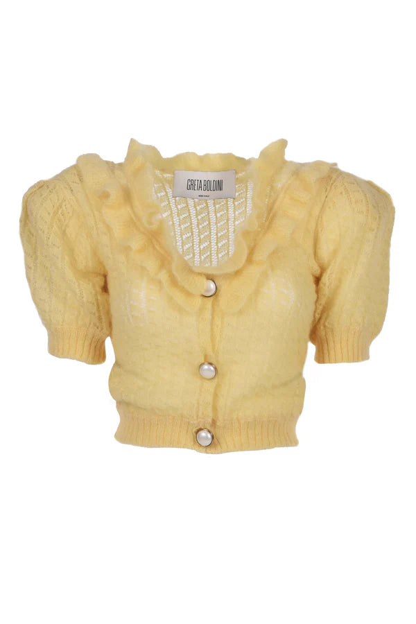Cardigan corto in maglia giallo burro con bottoni gioiello 