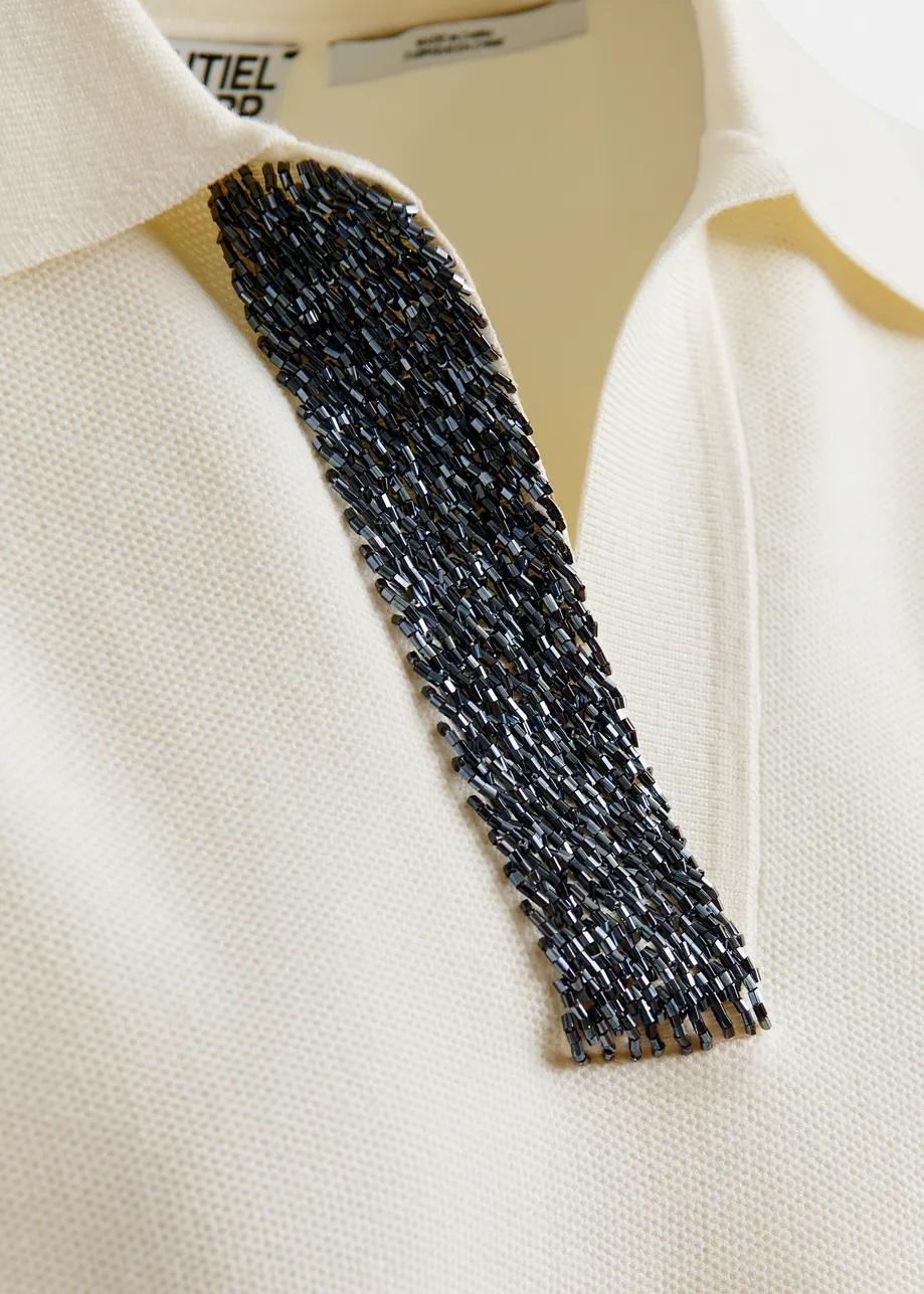 Top a polo bianco sporco e grigio con decorazioni di paillettes e perline INTERNATIONNAL005 ESSENTIEL
