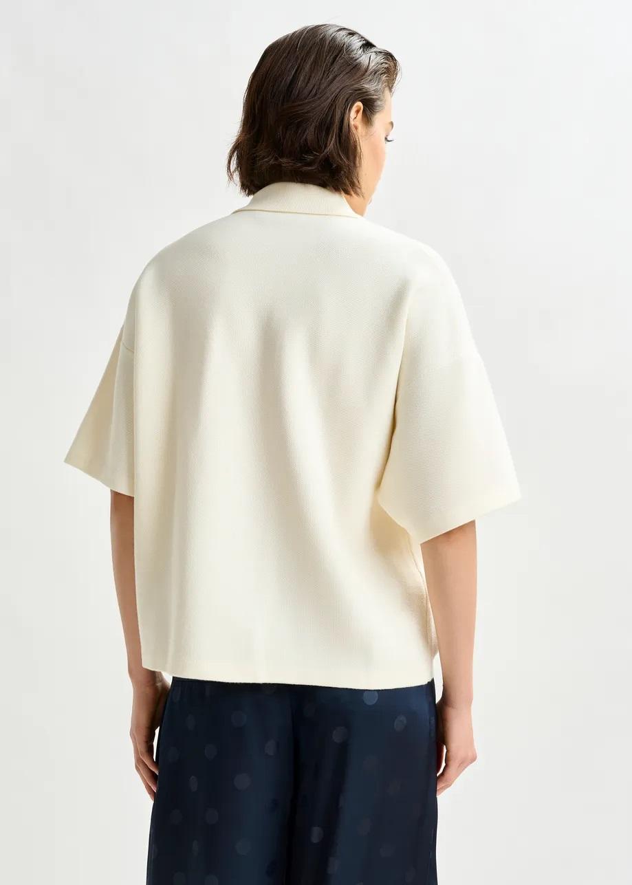 Top a polo bianco sporco e grigio con decorazioni di paillettes e perline INTERNATIONNAL005 ESSENTIEL